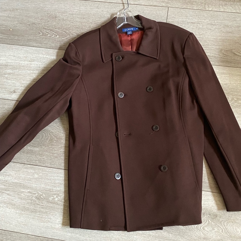 Stylish and sleek, this double breasted coat is a great go to piece!
